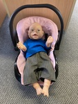 1059: Doll with capsule