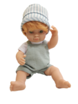 Doll in green overalls