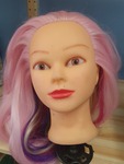 Mannequin head with pink hair
