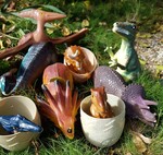 Dinosaurs with Three Eggs