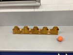 Wooden Ducks in a Row