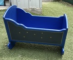 Blue wooden cradle