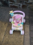 Pink pushchair