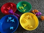 dinosaur and  coloured dishes