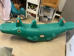 Green crocodile seesaw
