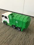 Green garbage truck