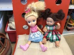 1 blonde, 1 brunette doll