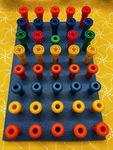 Peg board and pegs