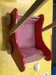 Red wooden pram