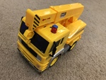 Yellow crane truck with buttons
