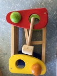 Wooden ball run with two balls and hammer