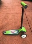 Green radio flyer scooter