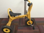 Yellow pedal tricycle 