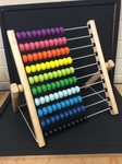 WOODEN ABACUS WITH MULTI COLOURED BEADS