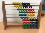 1 WOODEN ABACUS WITH MULTI COLOURED BEADS