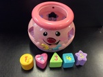 PINK COOKIE JAR SHAPE SORTER