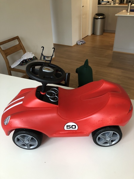 767: Red ride on Porsche 