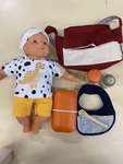 Doll with nappy bag