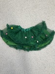 Green Skirt with pom poms