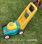 Yellow/Green Plastic Lawnmower