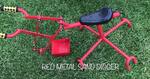 Red Metal Sand Digger