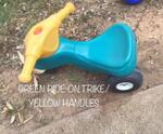 Green Ride- On Trike/ Yellow Handles
