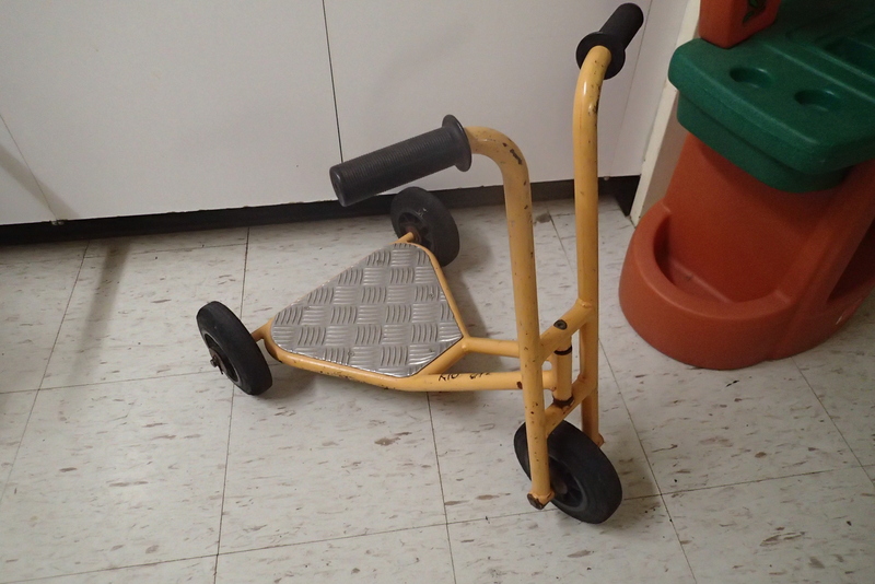 K10: Yellow 3 wheel scooter