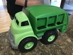 Green toy recycling truck