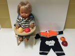 Doll in High Chair 
