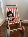 G142: Miniland Doll and Buggy