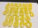 D173: Playdough cutters yellow numbers & letters