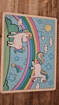 Unicorn jigsaw puzzle on board 