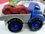 Blue Flatbed Truck with car