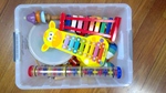 Tub of various musical instruments 