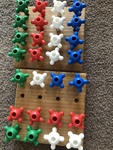 Coloured stacking pegs