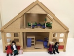 Wooden dolls house and furniture 