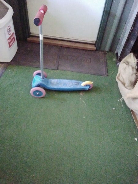 A2023: Blue rocketship scooter 