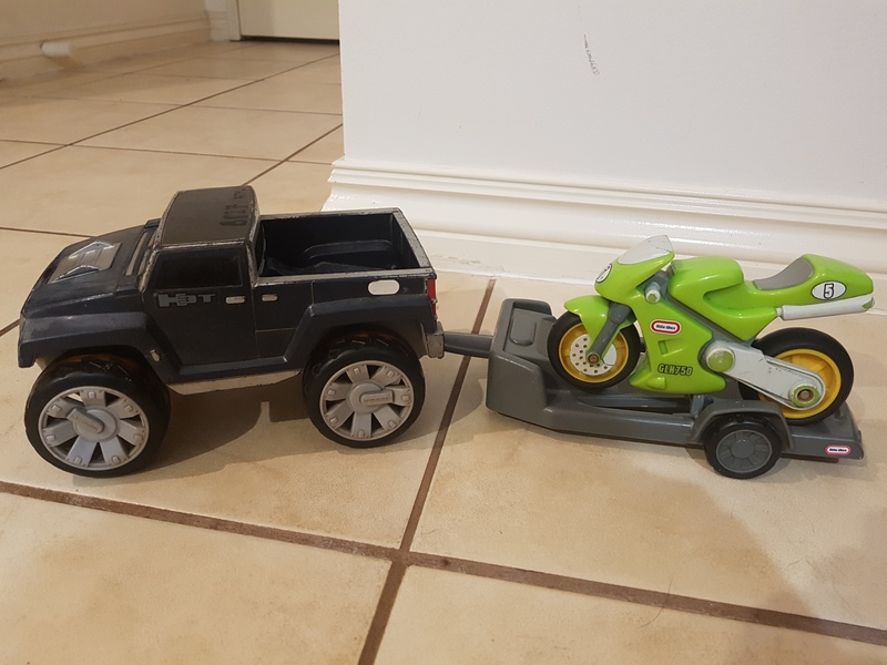 B827: Car with motorbike and trailer