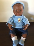 Baby African male doll