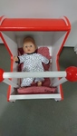 Red Pram with mattress and Doll 