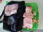 Doll in Carry Basket