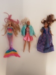 Three barbie dolls