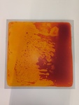 Red liquid sensory floor tile