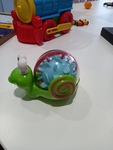 Plastic snail that makes noise