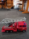 Red plastic firetruck with moving parts