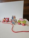 Pull along train with people and animals