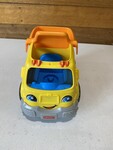 64: Fisher-Price Little People Dump Truck. 