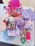 Doll with dress up and carry cot