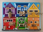 P17: Melissa and Doug Deluxe Latch Board 