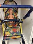 Doll stroller with hood and baby doll